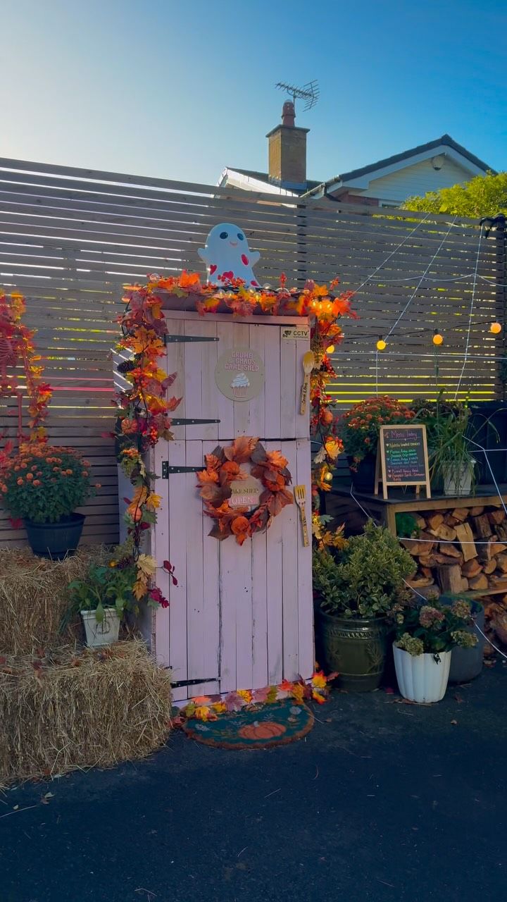 The Crumb & Chaos Cake Shed decorated for autumn